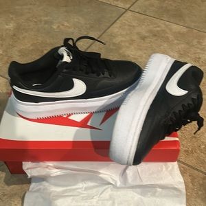 Woman’s Nike 7.5 new out of box black shoes